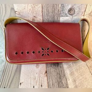 Mondani Red Leather Crossbody Bag Cutout Detail